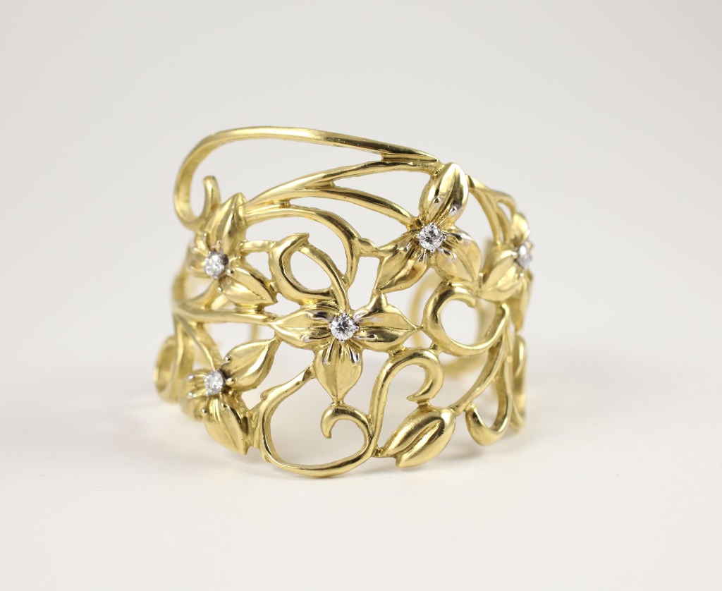 Marlene Stowe” 18k yellow gold lace and leaf cuff. the leaves are accented with six full-cut diamonds weighing 1.30cts.
