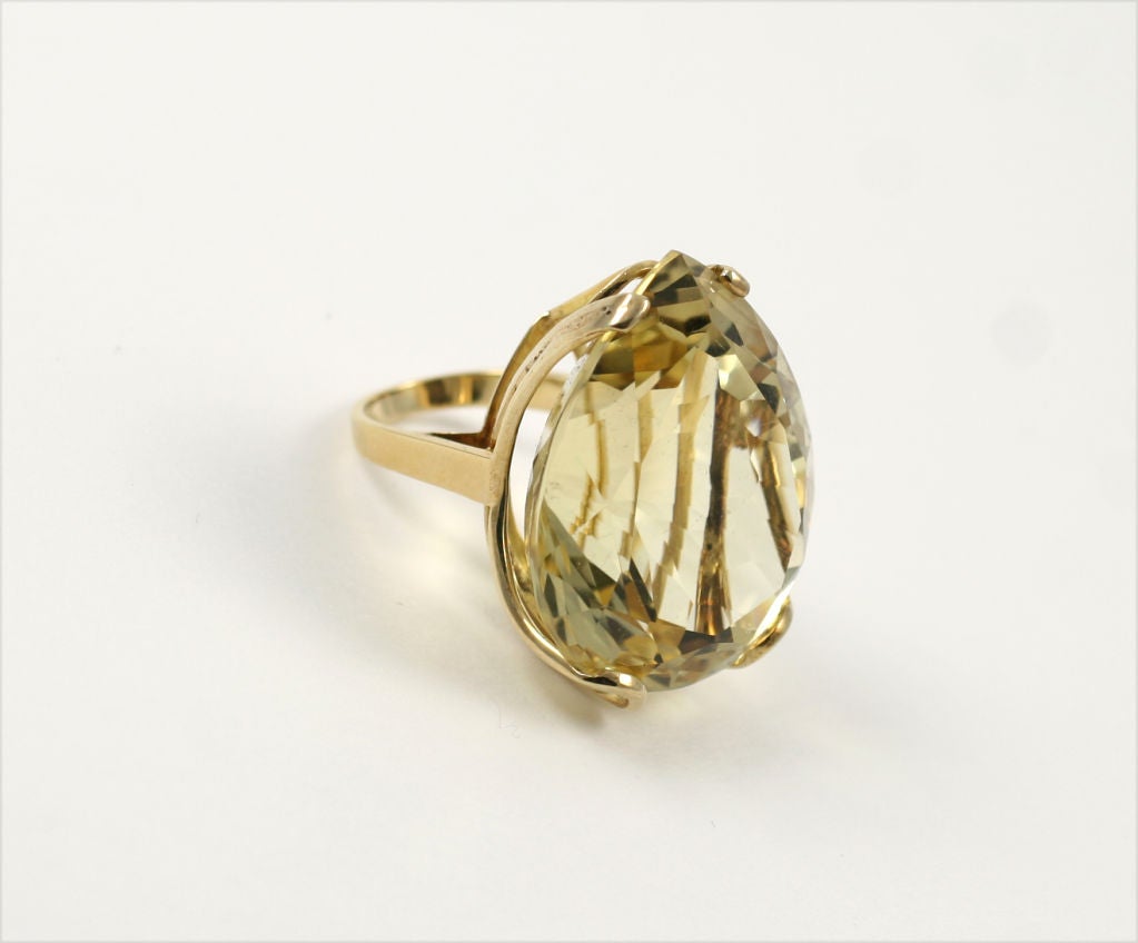 110 ct citrine pear shaped ring set in 18k yellow gold. Gross weigh 28.7g and size 7.