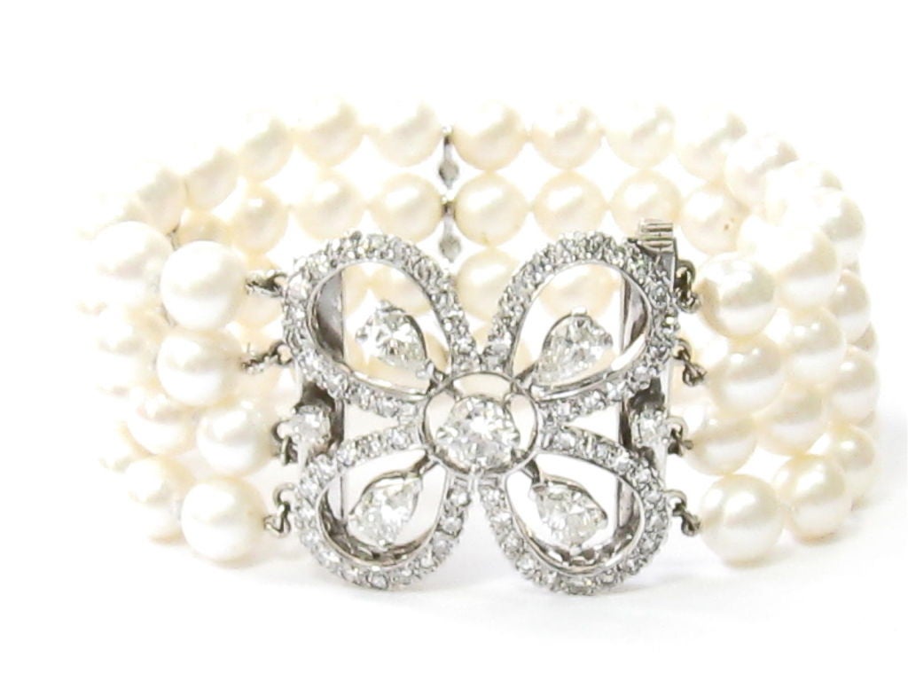 Platinum, Diamond and Cultured Pearl 4 Row Bracelet