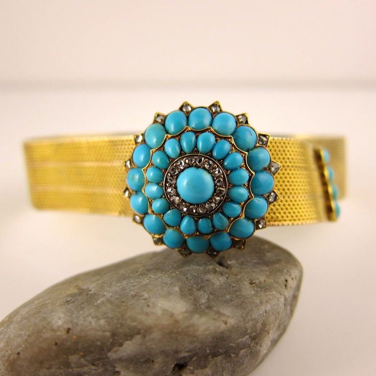 Victorian slide bracelet, make in 14K yellow gold and centered with circle cluster of robin's egg turquoise and rose cut diamonds. Bracelet is approximately 1/2 inch wide and adjusts smoothly to fit almost any wrist.