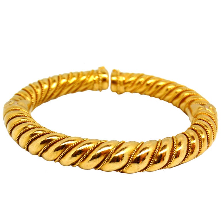 LALOUNIS Gold Torque Bracelet at 1stdibs
