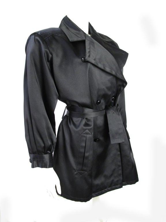 Yves Saint Laurent black satin trench coat. 42