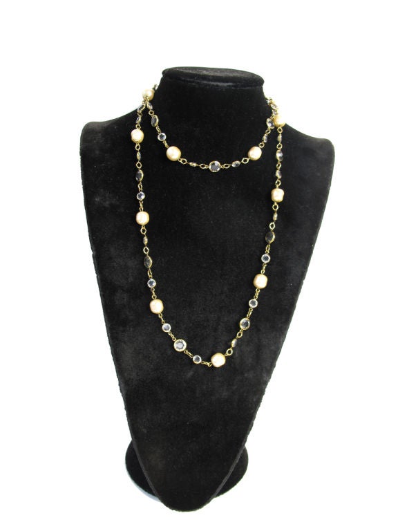 Chanel light grey crystal and faux pearl necklace. Condition:Excellent.
Circa 1981.
40 1/2