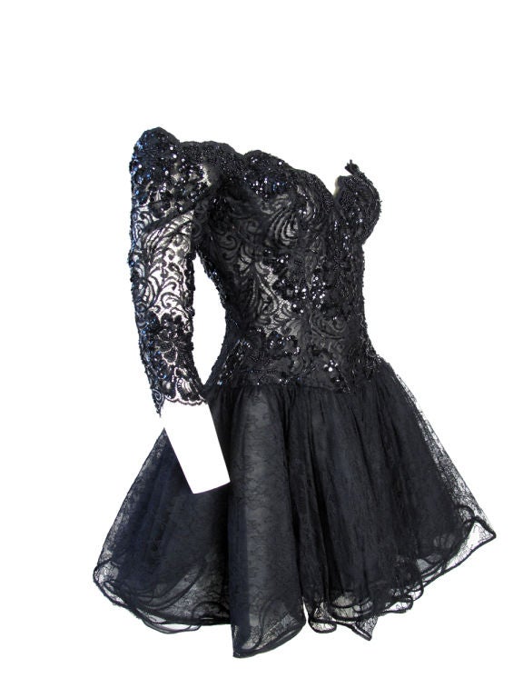 Vicky Tiel black cocktail dress with beading. 32
