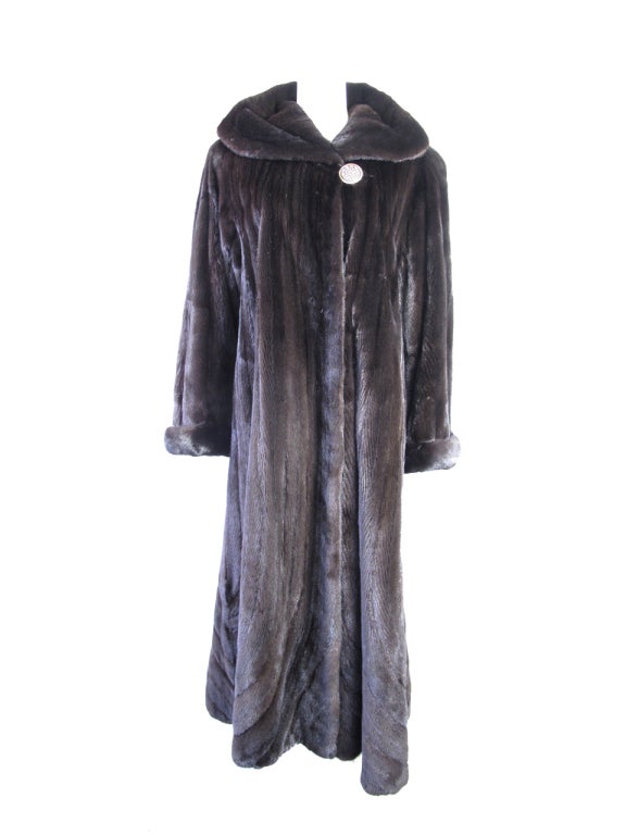 Louis Feraud brown mink coat.  Condition: Excellent. 48