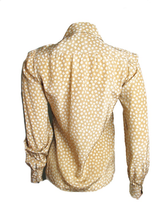 Yves Saint Laurent mustard colored silk printed blouse with neck tie.  36