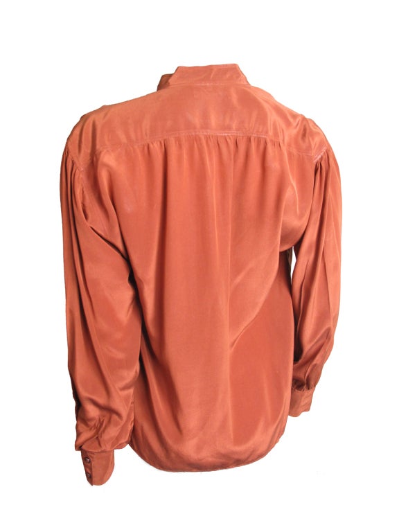 Yves Saint Laurent rust silk blouse. 40