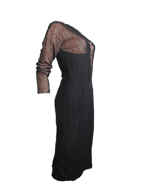 Early Oleg Cassini fringe dress.  Size 6.  Condition: AS IS, hole on one elbow and tears in mesh.  
34