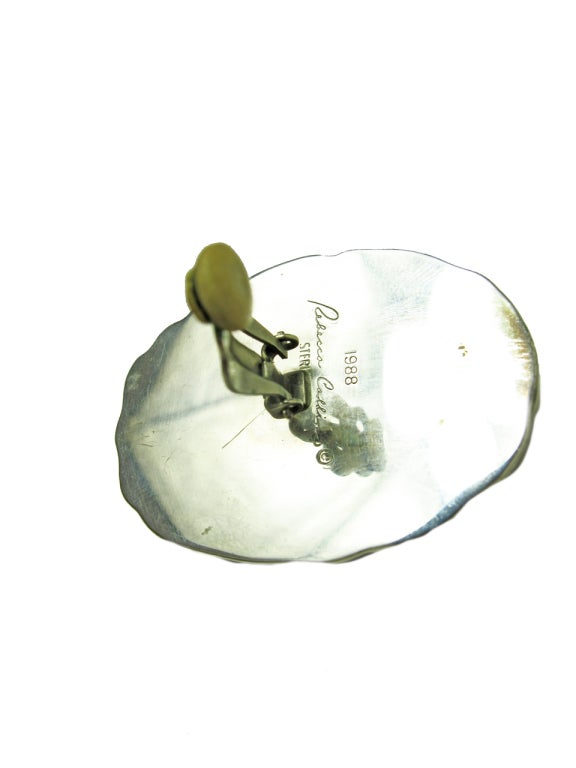 Rebecca Collins large carved jade and sterling silver earrings circa 1988.  Clip on.  1 3/4