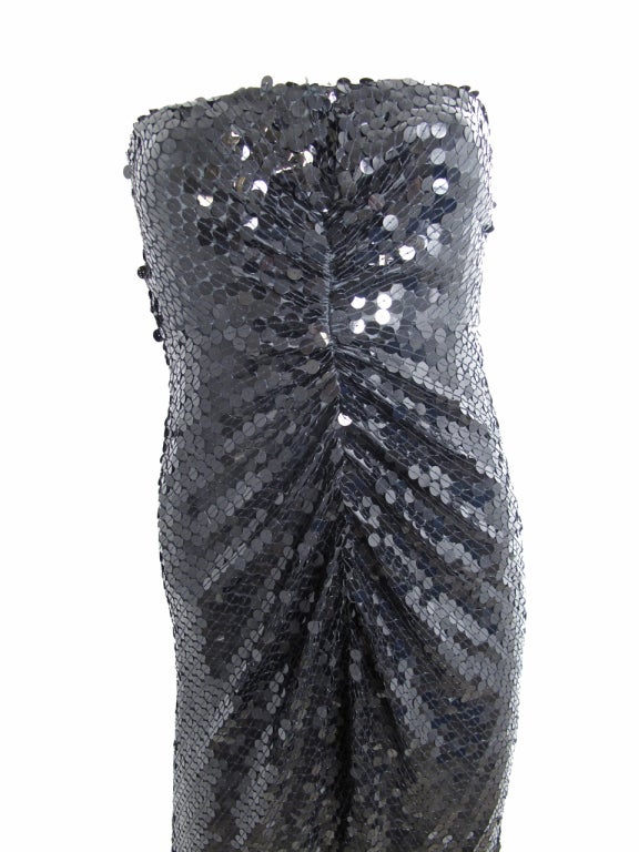 Oleg Cassini black strapless sequin gown.  

 28