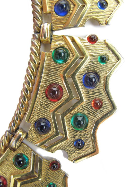 1960s Boucher metal choker with colored glass stones. Condition: some wear to goldtone.<br />
<br />
www.archivevintage.com