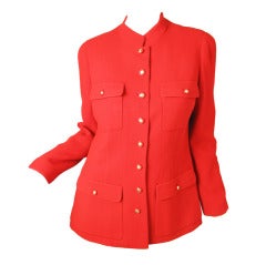 Chanel red jacket with " CC " buttons