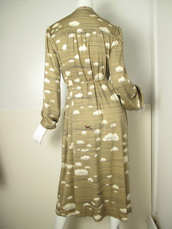 Hanae Mori airplane print dress with airplane buttons.  Snaps down front and on cuffs.  With removable waist belt.  Condition:Excellent.
