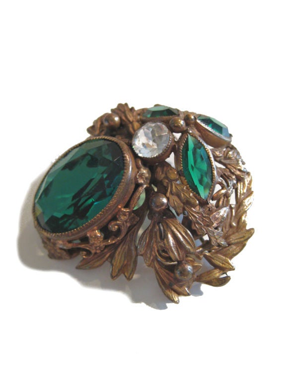 1940s Gorgeous Joseff of Hollywood brooch with green stone. Eugene Joseff was best known for his designs for Hollywood and theatre during the 20s - 40's. This brooch is in very good vintage condition. Signed Joseff of Hollywood. 

Company ceased