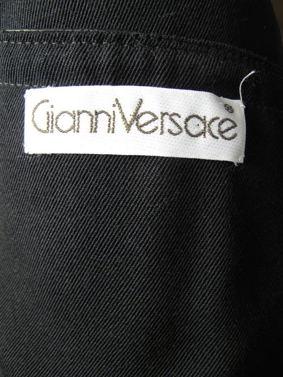 Women's 1980s Gianni Versace black skirt with large buckle