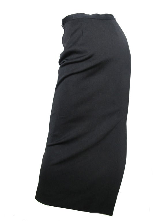 Yves Saint Laurent black wool long evening skirt with slit. 
27