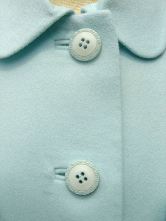 Versace baby blue wool 2 piece suit. Jacket and mini skirt. 100% wool. Gianni Versace Couture label- 1995. Jacket: 36