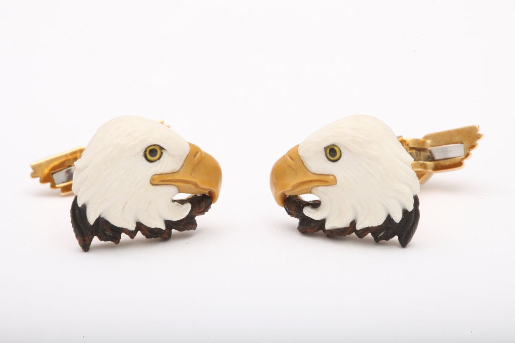 Carved from white chalcedony, yellow jasper and brown obsidian, these eagles are incredibly realistic- not to mention stylish.  The matching yellow gold wing shirt studs complete the dress set.  The cufflinks are available without the shirt studs