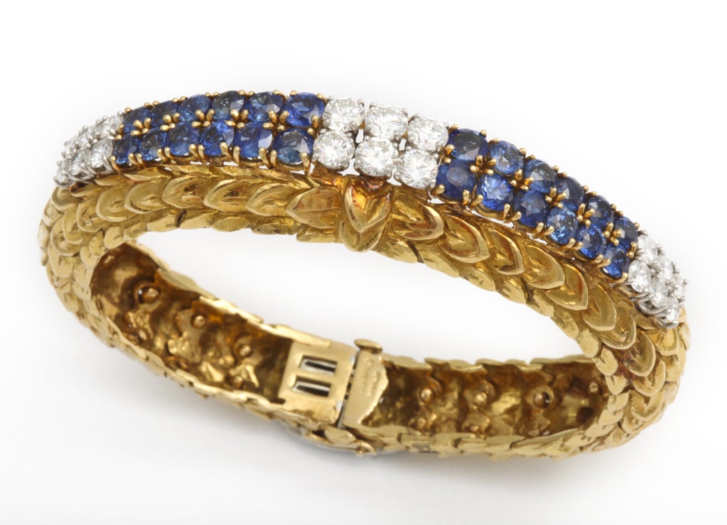 David Webb pair of sapphire, emerald and diamond bracelets 1