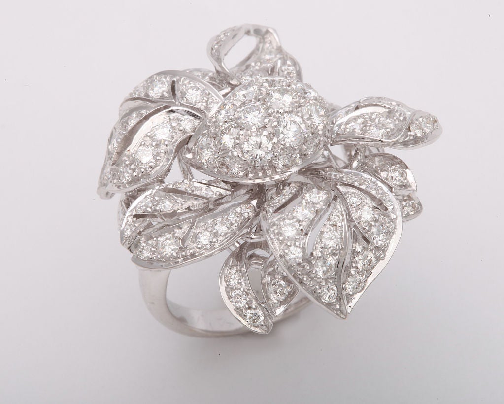 This flower ring features wonderful movement and great attention to detail.  Each petal is designed individually, giving the ring a bold size as well as an extremely feminine sensibility.