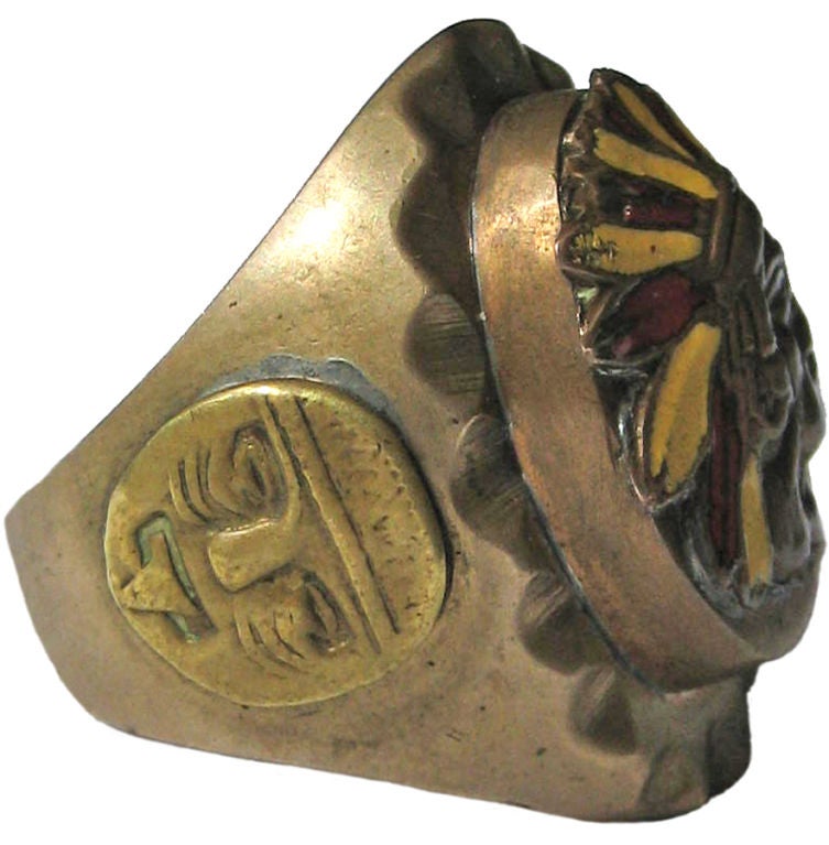 Popular with bikers, enlisted, and plain old manly men everywhere. Truly the handsomest Indian head face we've seen and the only one to ever grace our inventory - harder and harder to find. Mixed metal Mexican ring with 3/4 profile head, enameled
