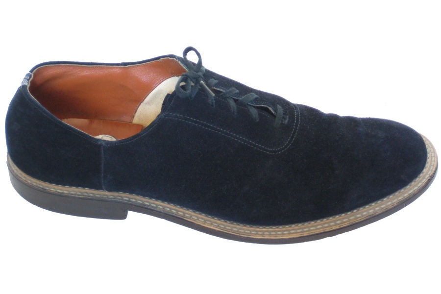 Go, cat, go! The Holy Grail in men's footwear. Having never seen a pair of original blue suede shoes from the era that made them hip, we can confidently say that it'll be a long time before we see another, let alone in such a wearable size. <br
