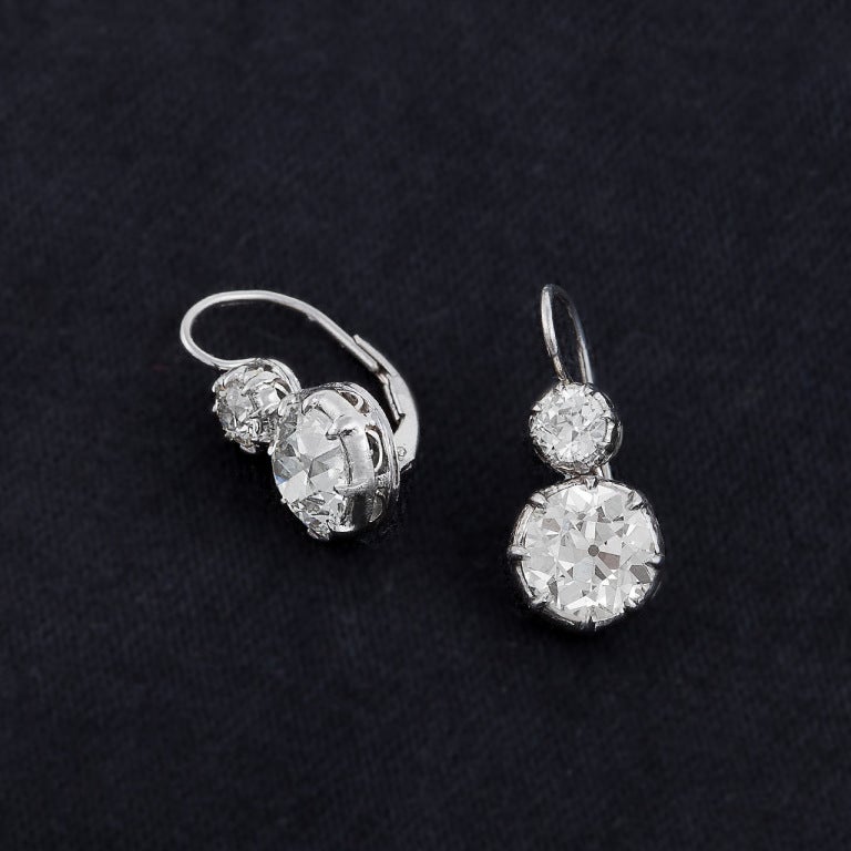 Contemporary Diamond & Platinum 2-Stone Earrings For Sale