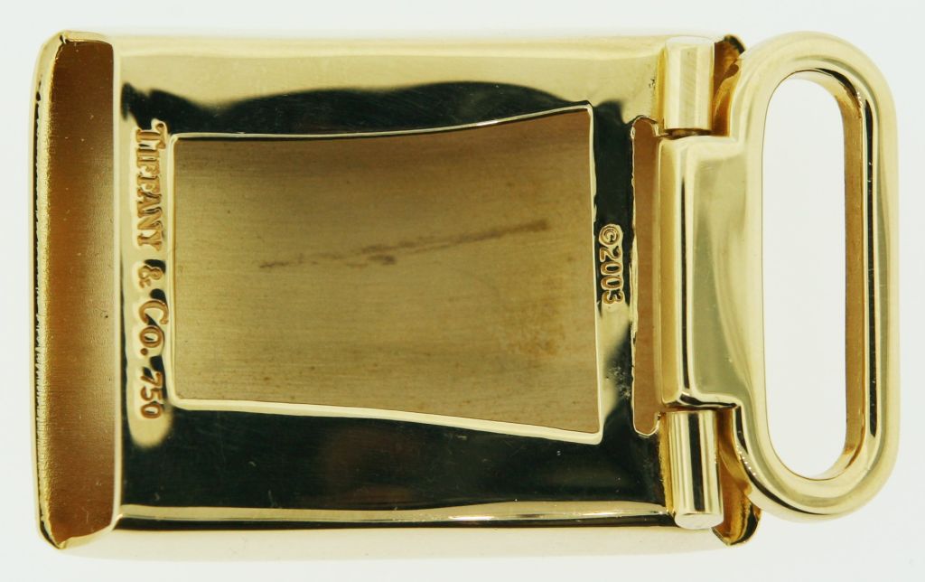 An 18 karat yellow gold belt buckle. Signed, Tiffany & Co.