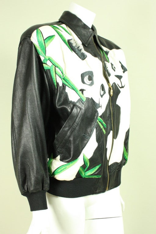 Circa 1980's jacket from Iceberg features adorable large-scale pandas on the front.  Turn down collar.  Ribbed cuffs and waist band.  Center front zipper.  Fully lined.

Labeled size Small.

Measurements-

Bust: 44