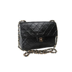 Chanel Quilted Leather Handbag with Gold Hardware