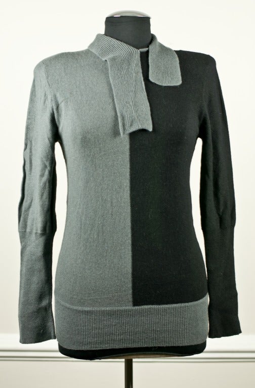 French Designer...made in Italy this Rykiel color blocked sweater has a ribbed tie for a bow at the neck.