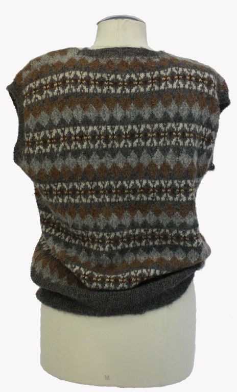 Edina and Lena are one of the most iconic British Hand knitters of the '70's. This vest could be appropriate for Men and Women.<br />
<br />
The Vest is knitted of 100% Alpaca and the design is exclusively theirs. It wasn't  unusual for them to