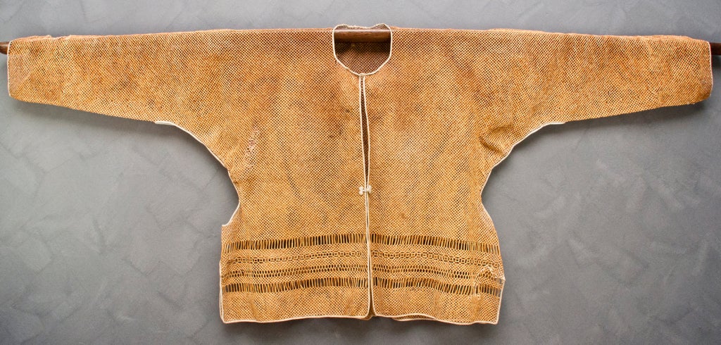 This unique and special Handmade jacket was originally used as an undergarment Chinese royalty wore under their sik robes. These jackets are very rare and have Ben in the collections of numerous museums. Great to display or wear out.