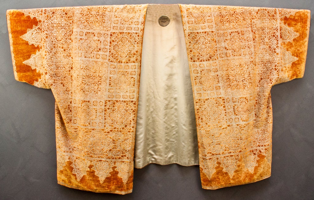 Silver/Gold metallic screened on 100% silk velvet with original silk lining. A rare find!