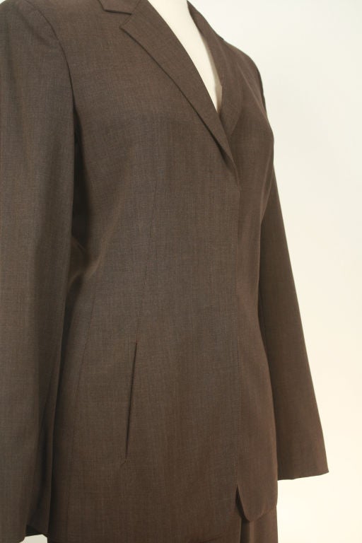 Calvin Klein Pant Suit in a heather brown fabric, three button, 2 in-seam side pockets. The pants have 2 front side pockets, front  zip to an inch waistband.