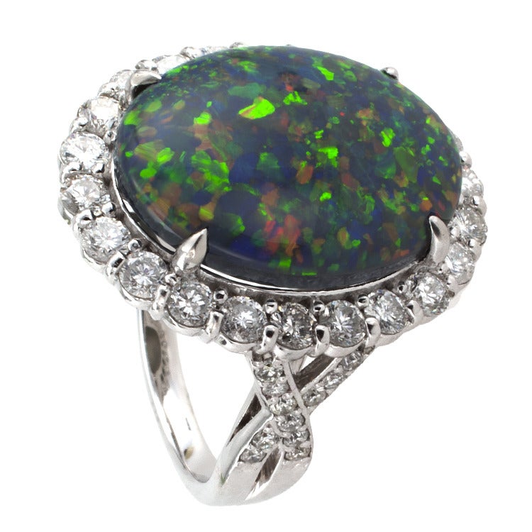 Contemporary Incredible Black Opal and Diamond ring.