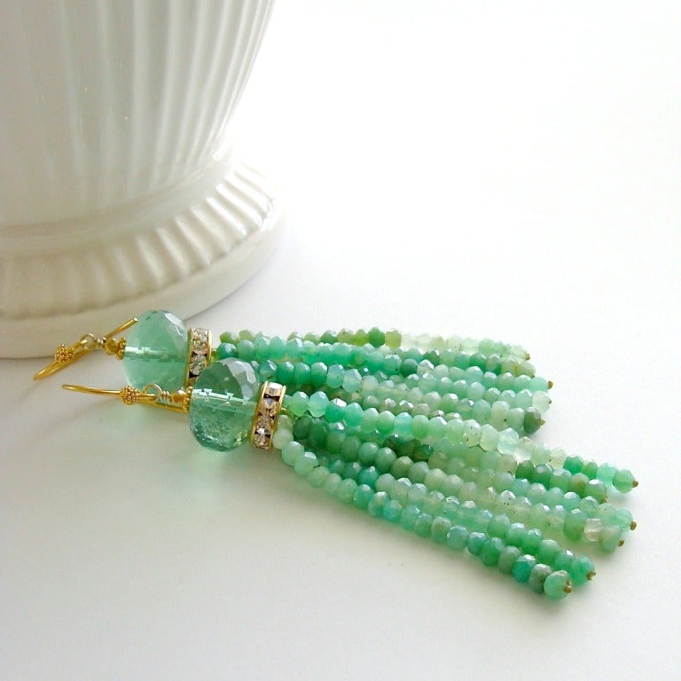 Shaded chrysoprase rondelles create sinewy tassels that are gently crowned with luxe faceted green fluorite beads and designed to swing and sway with your every move.  Simple pollen head ear wires and little crystal rondelles add just the right