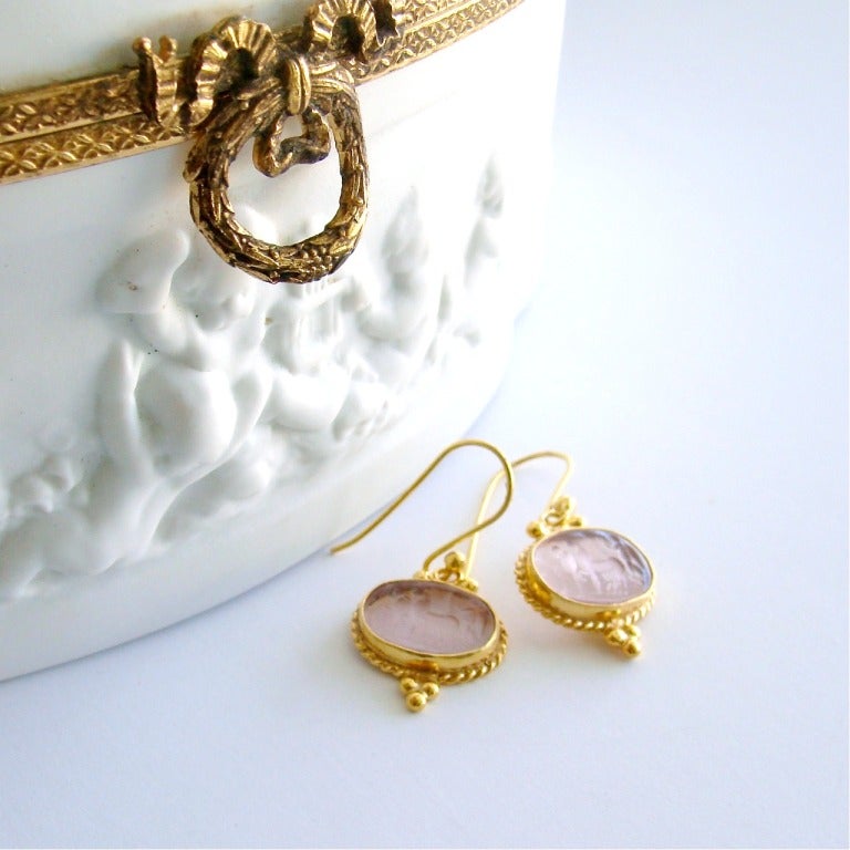 Pia Earrings - Gorgeous blush pink glass intaglios, reminiscent of the souvenir intaglios brought back from an Old World Grand Tour, create a classic and timeless earring design.  The simple twisted frame and petite granulation in gold plated
