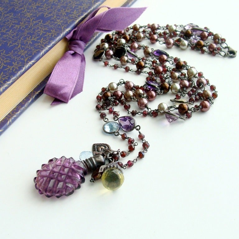 Gisela Necklace - Profusely rich acai berry-colored garnets are on the forefront of fashion this year with the explosion of jewel tones for the Fall and Winter.  In particular, reds and purples in all shapes and forms seem to be on every