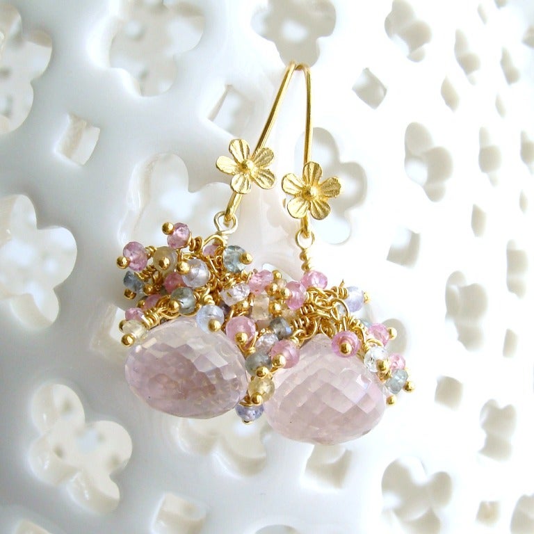 Softly colored rose quartz faceted â??kissesâ?? have been topped with a cascade of delicate pastel sapphire tendrils creating a pair of romantic fairy tale earrings.  The gold vermeil earrings have been paired with an ear wire featuring a dainty