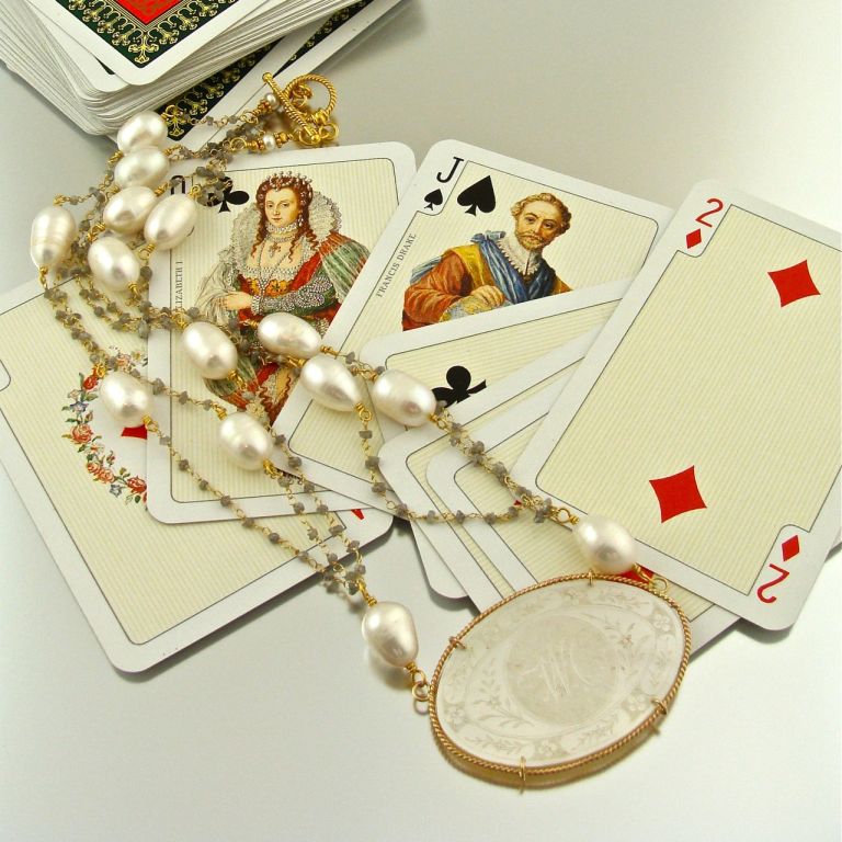 During the early 1700’s, wealthy European families commissioned Chinese artisans to make finely engraved sets of mother-of-pearl gaming counters for use in parlor games such as Ombre, Quadrille, Loo and Whist.  Starting with simple Chinese designs