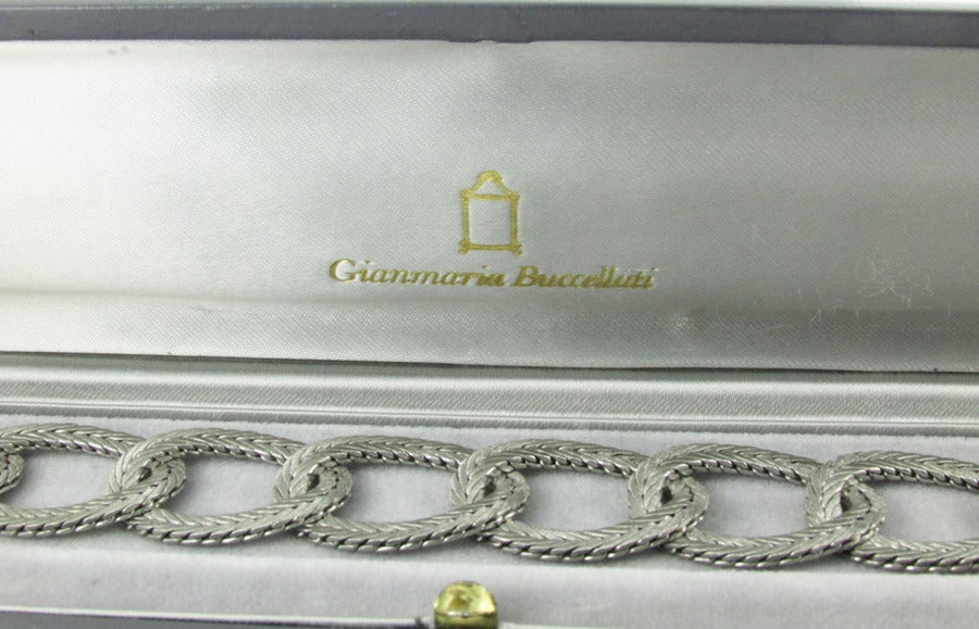 Woven platinum oval link bracelet with a wheat design.  Signed Buccellati with Italian hallmarks. Comes in original box.