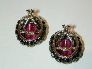 18KT white gold, rubellite, diamond and rose-cut quartz earrings each having at center a faceted oval rubellite surrounded by prong-set round diamonds with the outer perimeter being rose-cut yellow-ish quartz.