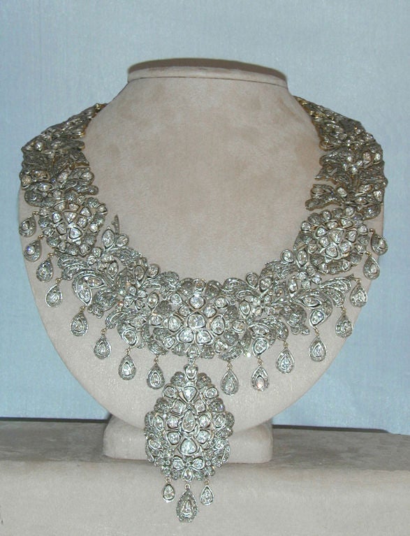 Large Indian bib necklace in the Mogul-style made of silver-topped yellow gold set with rose cut diamonds weighing a total of approximately 20+ctTW.