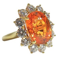 Vibrant Spessartite diamond ring
