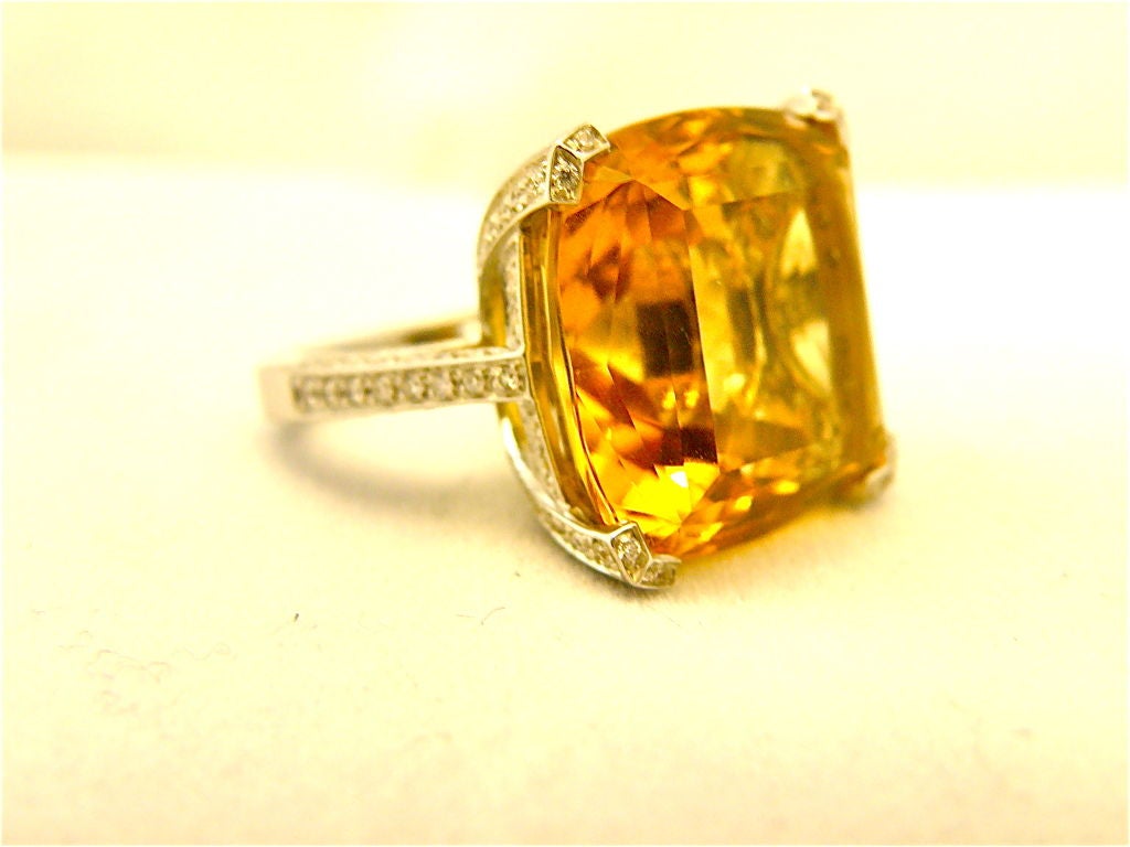 Lovely Asprey's London, 18k white gold Citrine diamond ring. Citrine weighs approximately 20 carat. Diamonds weigh approximately 2 carats. Stamped 