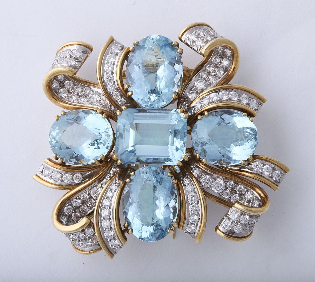 A Diamond, gold, and aquamarine brooch by Jean Schlumberger; Tiffany & Co.