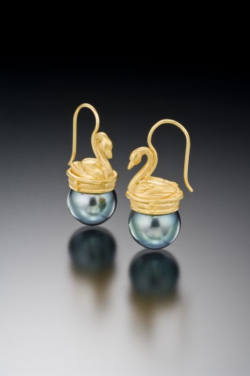 These earrings are a signature piece for me, a classic design that I never grow tired of making.  The 22Kt gold swans float above the pearls with a sculptural grace and elegance when on the ear. The South Sea pearls are the perfect counterpoint for