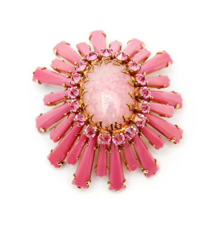 Pink keystone Schreiner pin with gold-toned metal setting and inverted pink crystal accents.