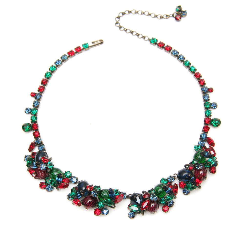 Gorgeous CIS parure of brooch, necklace, and earrings with red, green, and blue rhinestones and swirled cabochons.  Circa 1950. CIS was a line created by Countess Cissy Zoltowska during the mid 1950's. Cissy designed high quality costume jewelry for
